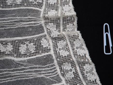 detail of a detachable lace collar