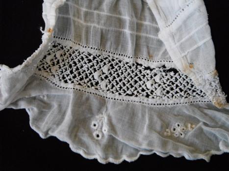 detail of cuff of white blouse