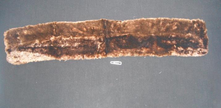 A strip of brown seal fur used as a belt or collar