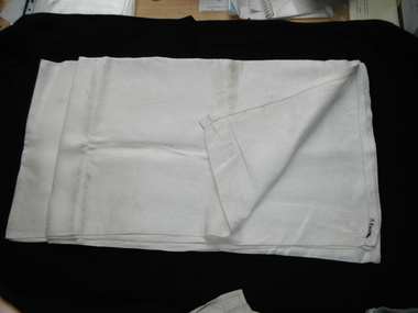 a white dining table cloth