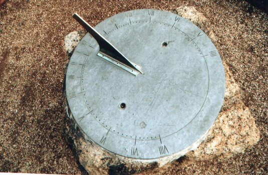 Sundial on granite pillar