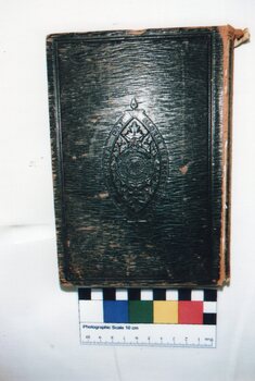 Dark brown psalms and hymn book belonging to Samuel Amess. Embossed on front cover "GLORIA IN EXELSIS DEO" "ET IN TERRA PAX".