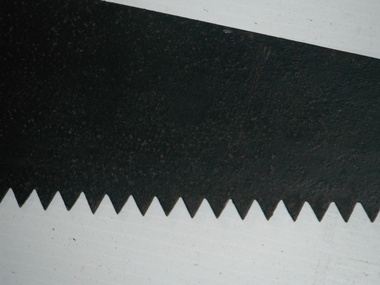 detail of the crosscut saw