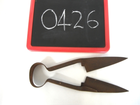 rusted hand shears with catalogue number