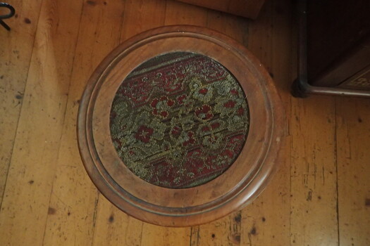 photograph of commode showing embroidery