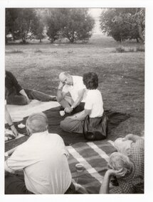 Photograph of gathering at a picnic, <1975