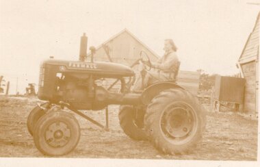 Billie Wilson on Tractor, c.1941