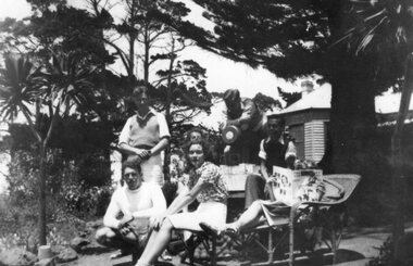 Group of people in front of cannon, c.1939