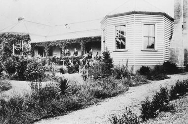 Photograph of the Amess Family outside the House, c.1890s