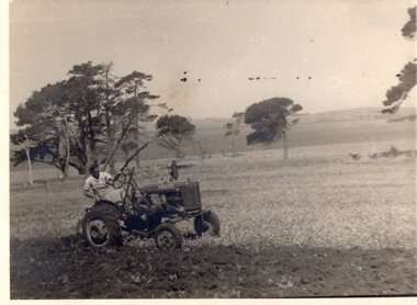 Ted on tractor ploughing, Unknown
