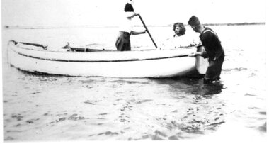 Photograph - Black and white photograph of three people in a whaleboat, c.1940