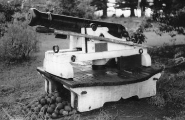 Photograph - Black and white phograph of a cannon, c.1950