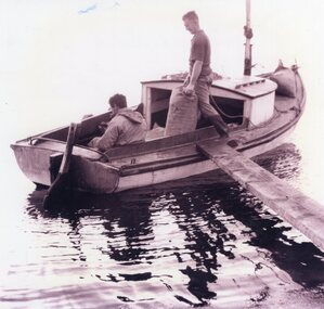Photograph - Photograph of two people in a boat, C.1941