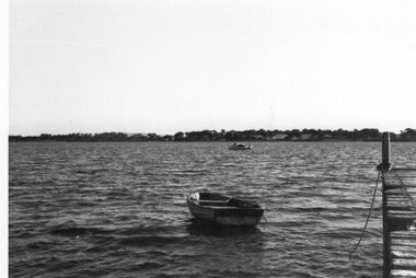 Photograph - Photograph of dinghy tied up