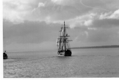Photograph of ship sailing away