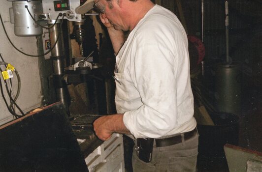 Photograph of Trev making bagging needle
