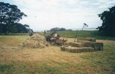 Photograph of hay baler and hay