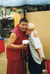 Photograph of Tibetan monk and a teenage boy
