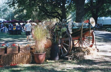 Photograph of a wagon and hay bales