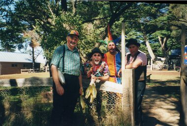 Photograph of four clowns