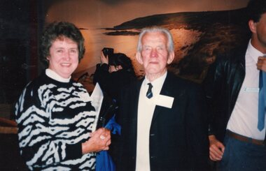 Photograph of two people shaking hands