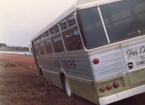 a photograph of tilted bus