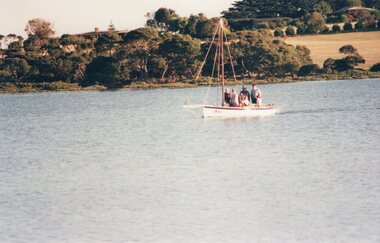 Photograph of a small sailboat
