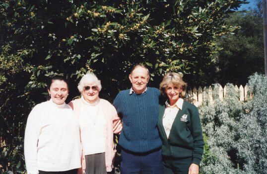 Photograph of group of four people