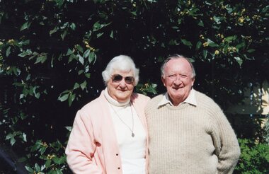Photograph of two people taken outside
