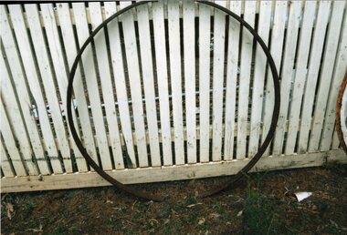 photograph of an iron wheel rim