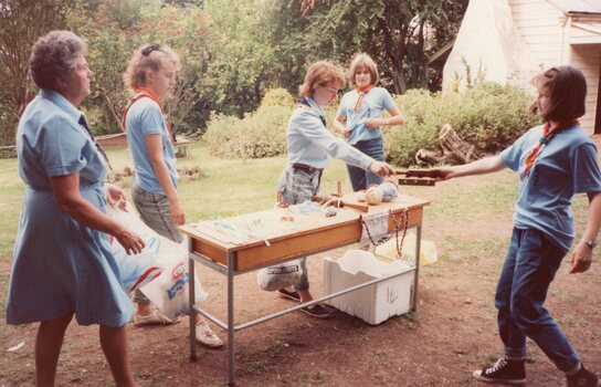 Photograph of group gathered around craft table