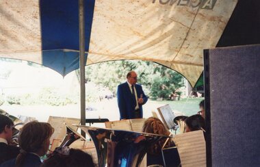 Photograph of band and conductor