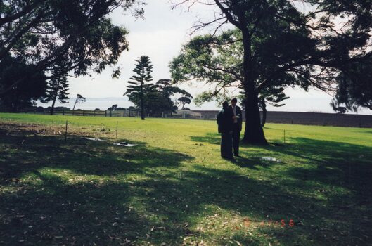 Photograph of two people standing together