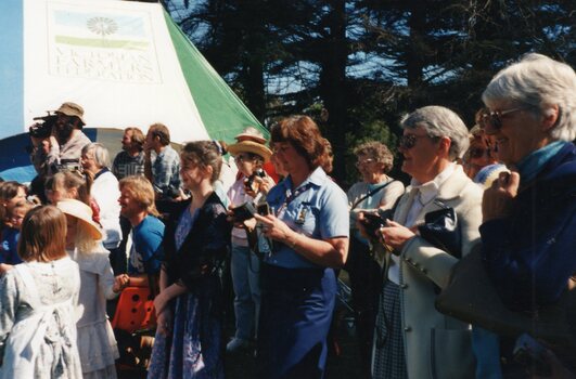 photograph of group and marquee