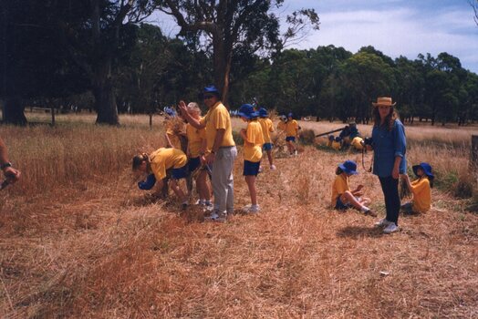 Photograph of schoolchildren in paddock