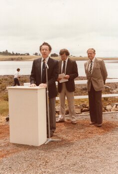 Photograph of man at lectern