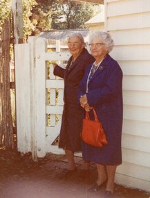 a photograph of two woman