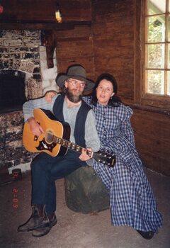 Photograph of seated man and woman