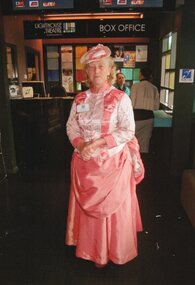 Colour photograph of woman in costume