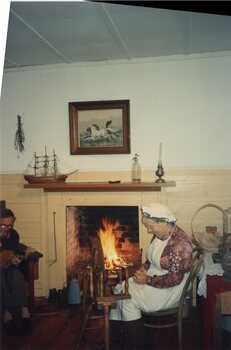 Colour photograph of seated woman