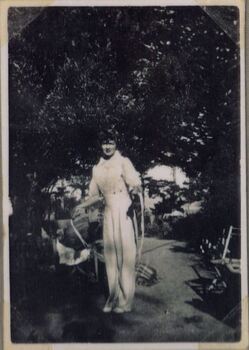 a photograph of standing woman