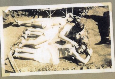 a photograph of people sunbathing