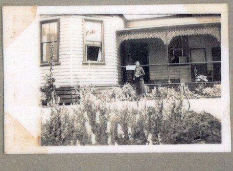Photograph of woman in front of Amess House