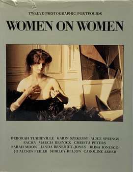 Text appears above and below a photograph of a woman sitting alone in a formal room wearing, a glamorous gown with her breast exposed. . 