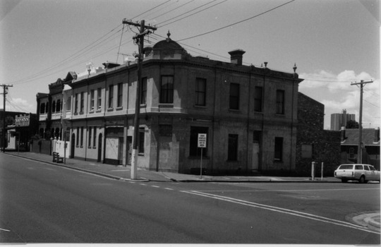 Substantial two storey building on a street corner.