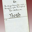 Folded handwritten contract.