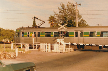 Photograph - Last electric train to Port Melbourne crossing Bridge Street, Glen Stuart, 10 Oct 1987