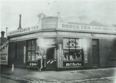 Photograph - Miss Jago's corner grocery shop at Ingles and Heath Street, Port Melbourne, 1950s