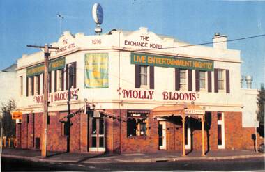 Colour photo of Molly Blooms, a two-storey corner building, also identified as The Exchange Hotel, 1916.