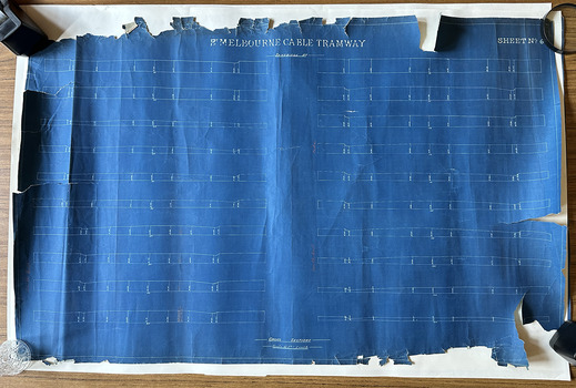 Large blueprint badly torn around the edges.